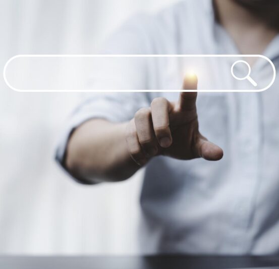 hand-touching-with-search-icon-search-engine-optimisation-seo-concept-find-information-by-internet-connection