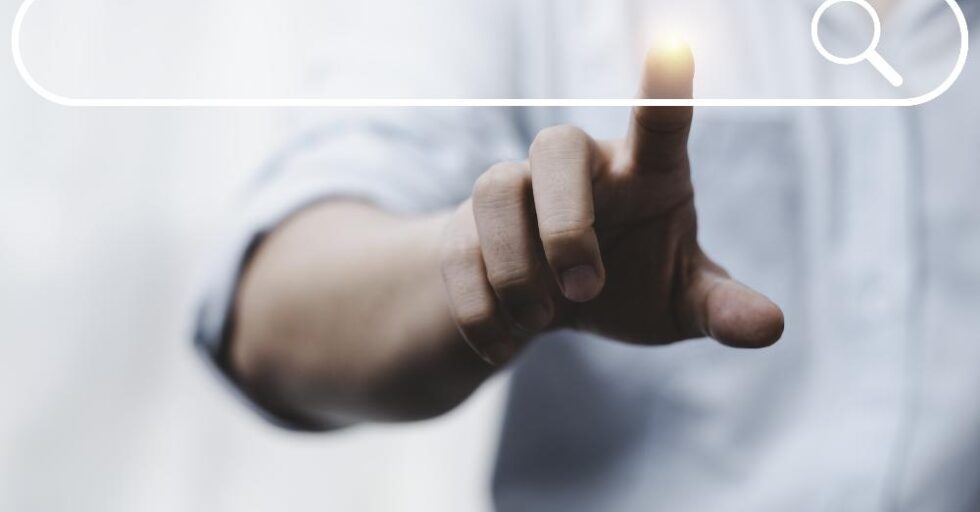 hand-touching-with-search-icon-search-engine-optimisation-seo-concept-find-information-by-internet-connection